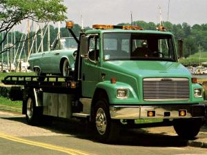 1997 Freightliner FL70 Roll-On Wrecker Truck